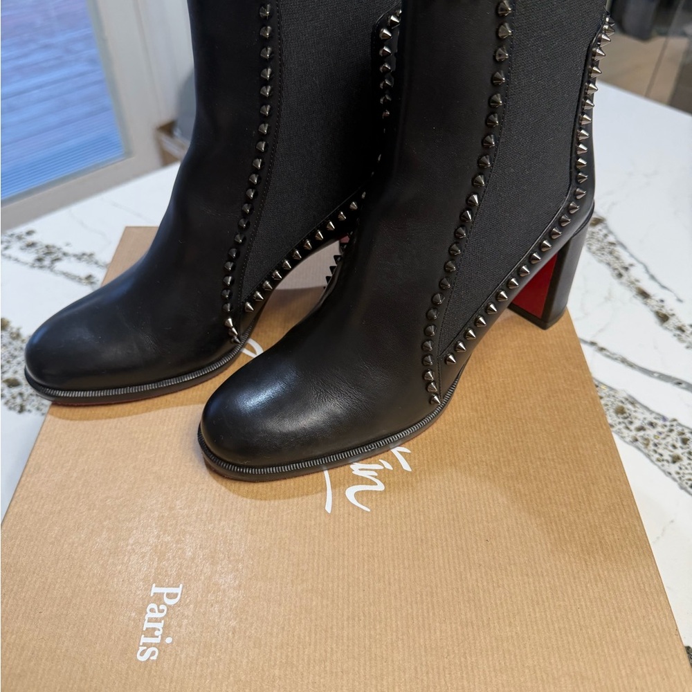 Christian Louboutin Black Outline Spikes. Barely worn. Like new.